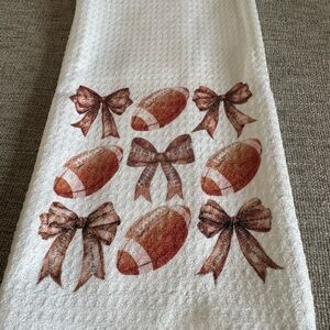 Football and Bow Design Tea Towel